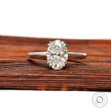 Oval lab grown diamond solitaire ring in 14K white gold