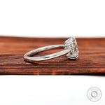 Side profile of oval diamond ring in white gold