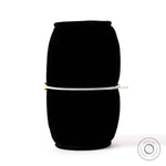 Dainty lab grown diamond bangle bracelet displayed on black stand