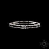 Graduating lab grown diamond bangle bracelet front view on black background