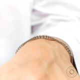 Interior profile of solid gold diamond bangle bracelet with hidden clasp