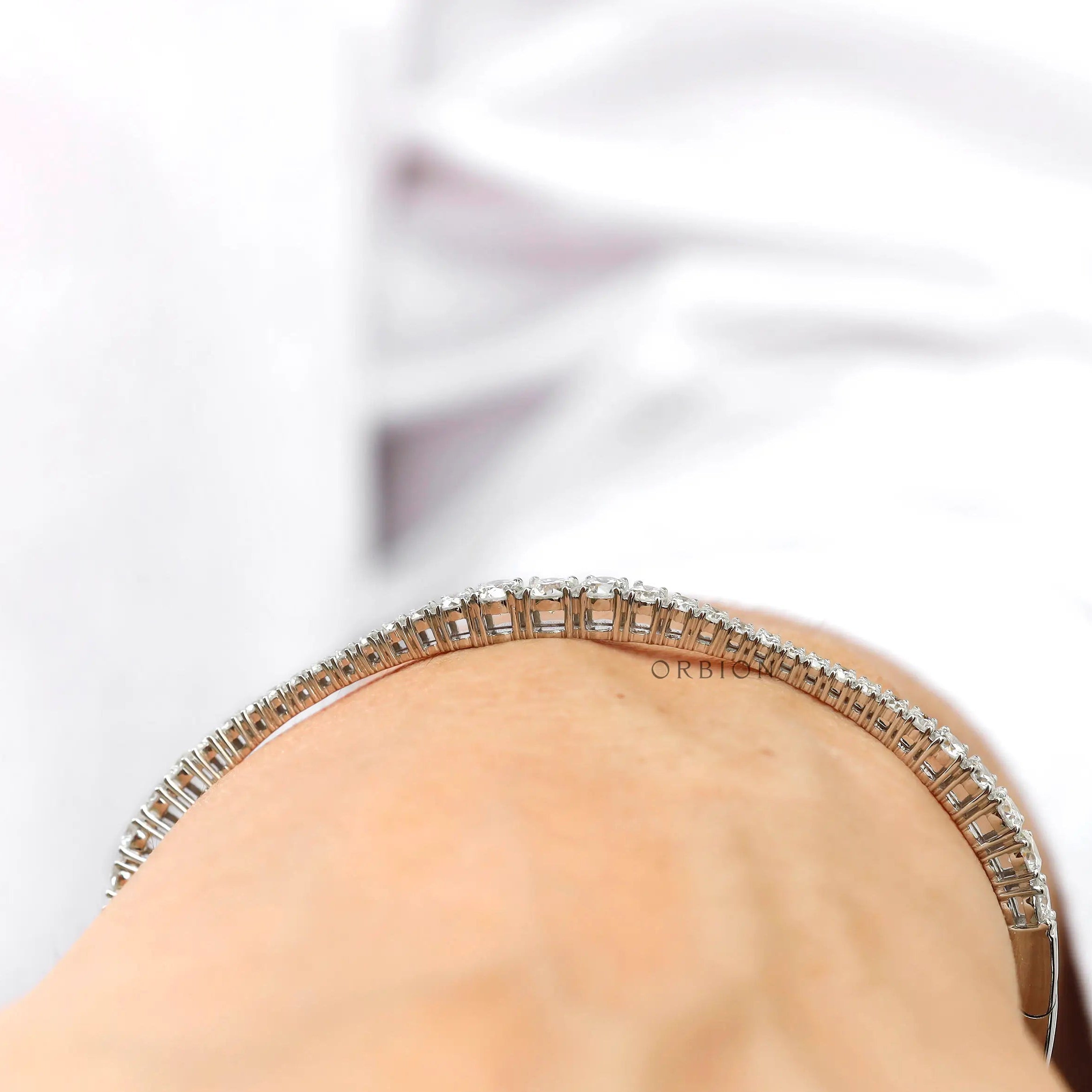 Interior profile of solid gold diamond bangle bracelet with hidden clasp