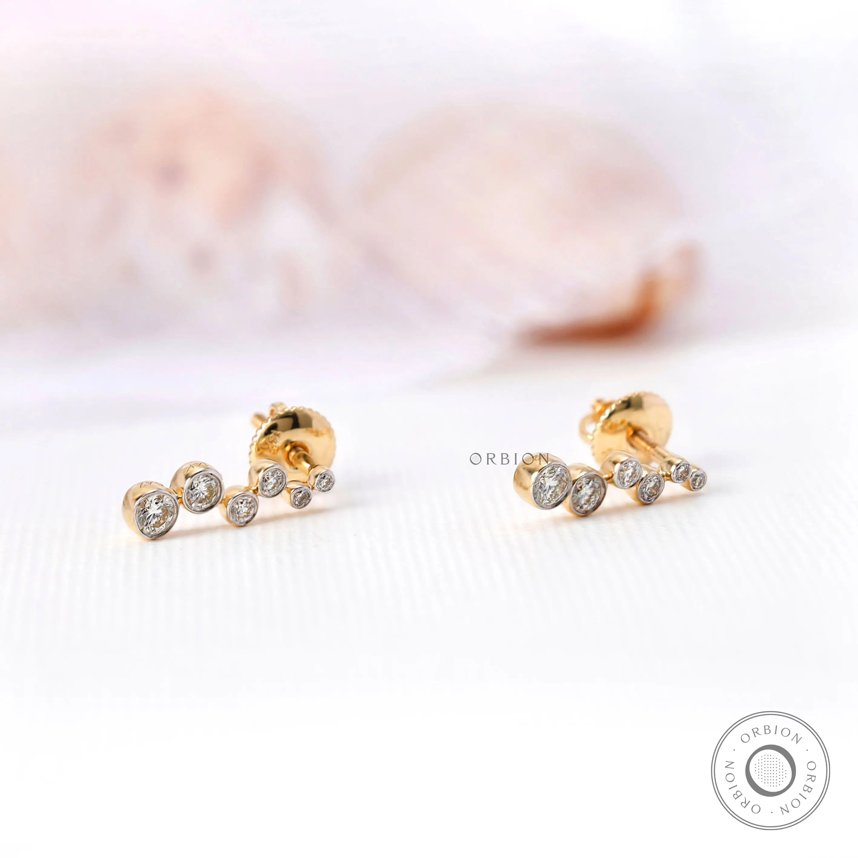 Graduated lab grown diamond drop stud earrings