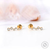 Bezel set diamond bubble earrings modern design