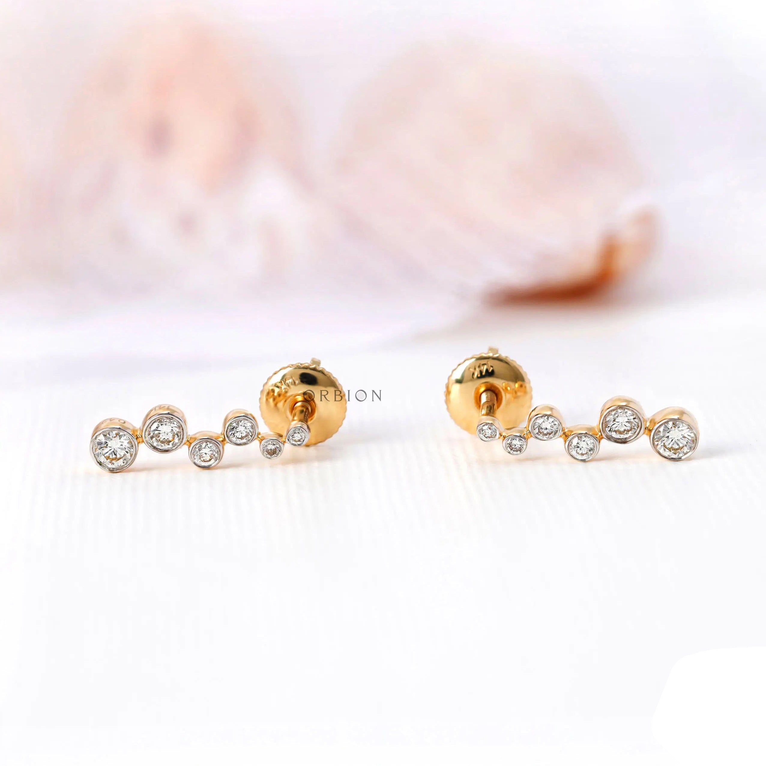 Bezel set diamond bubble earrings modern design