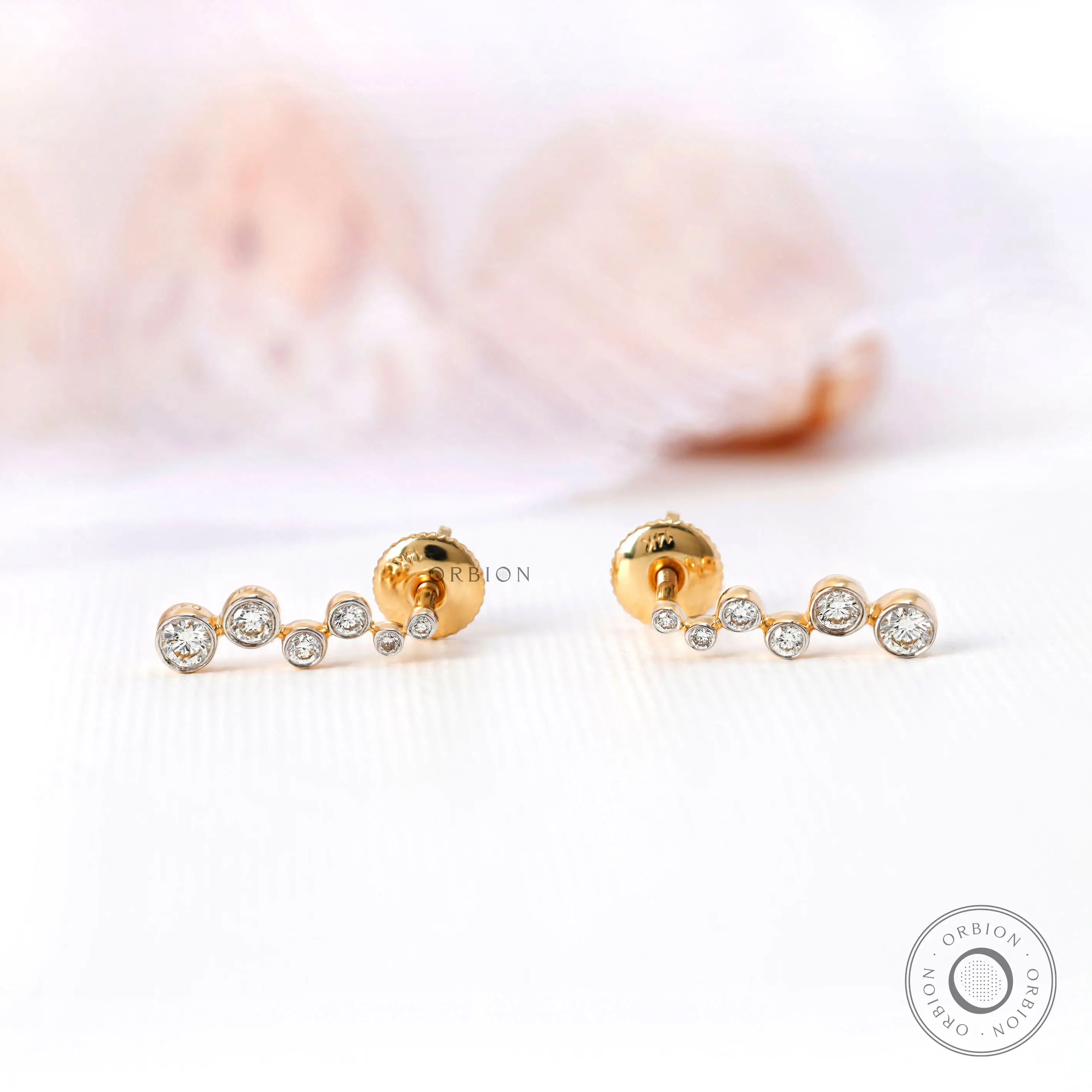 Bezel set diamond bubble earrings modern design