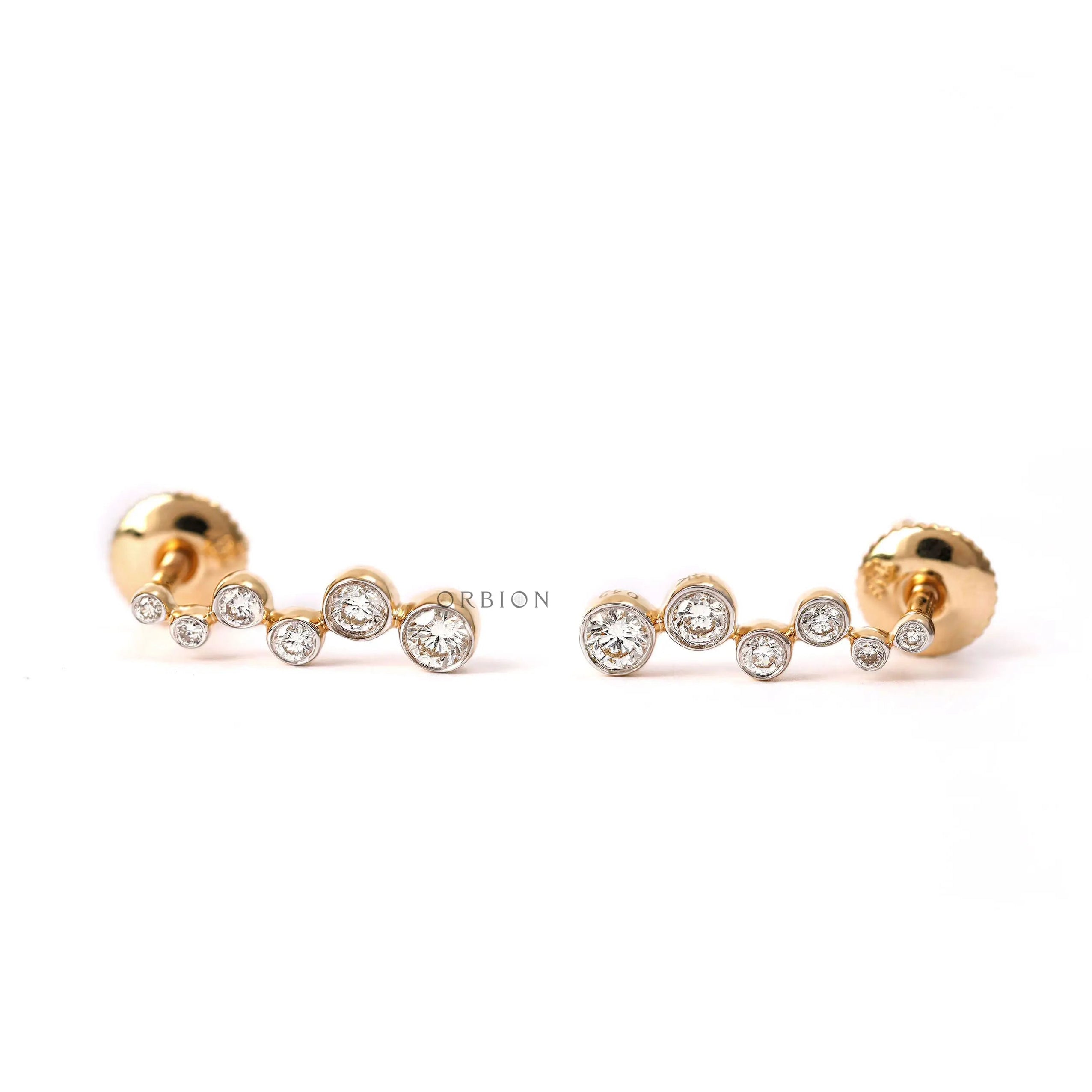 Graduated lab diamond swirl journey earrings in 14k yellow gold