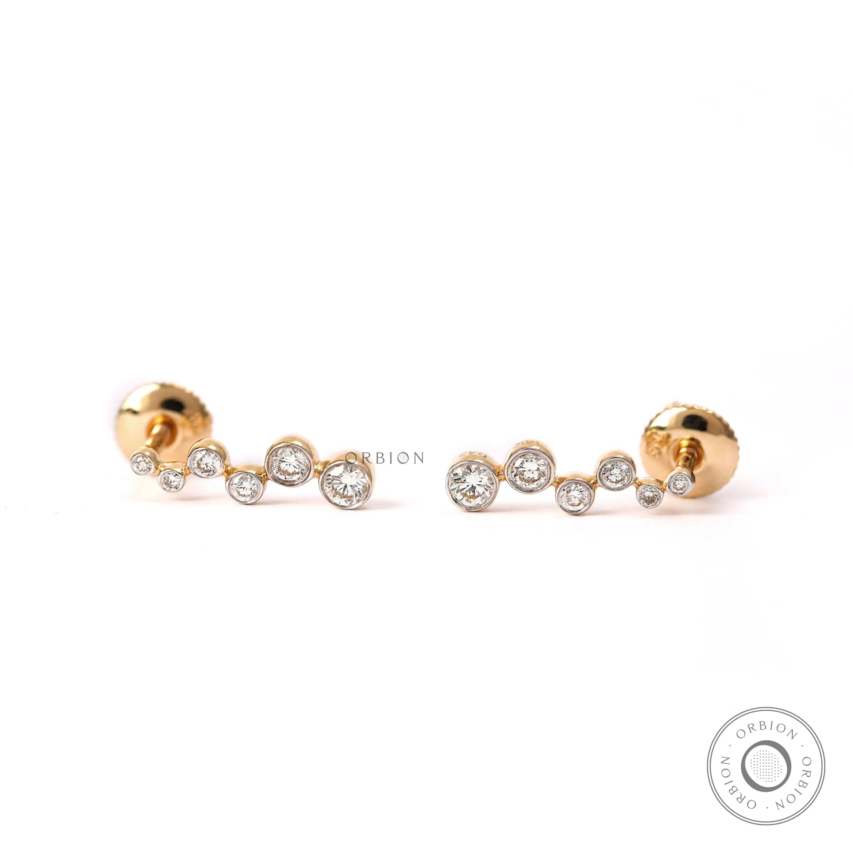 Graduated lab diamond swirl journey earrings in 14k yellow gold