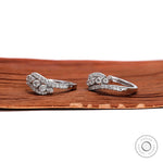 Close up of brilliant cut lab grown diamond cluster earrings