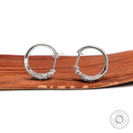 White gold huggie hoops with 0.63 TCW lab diamonds