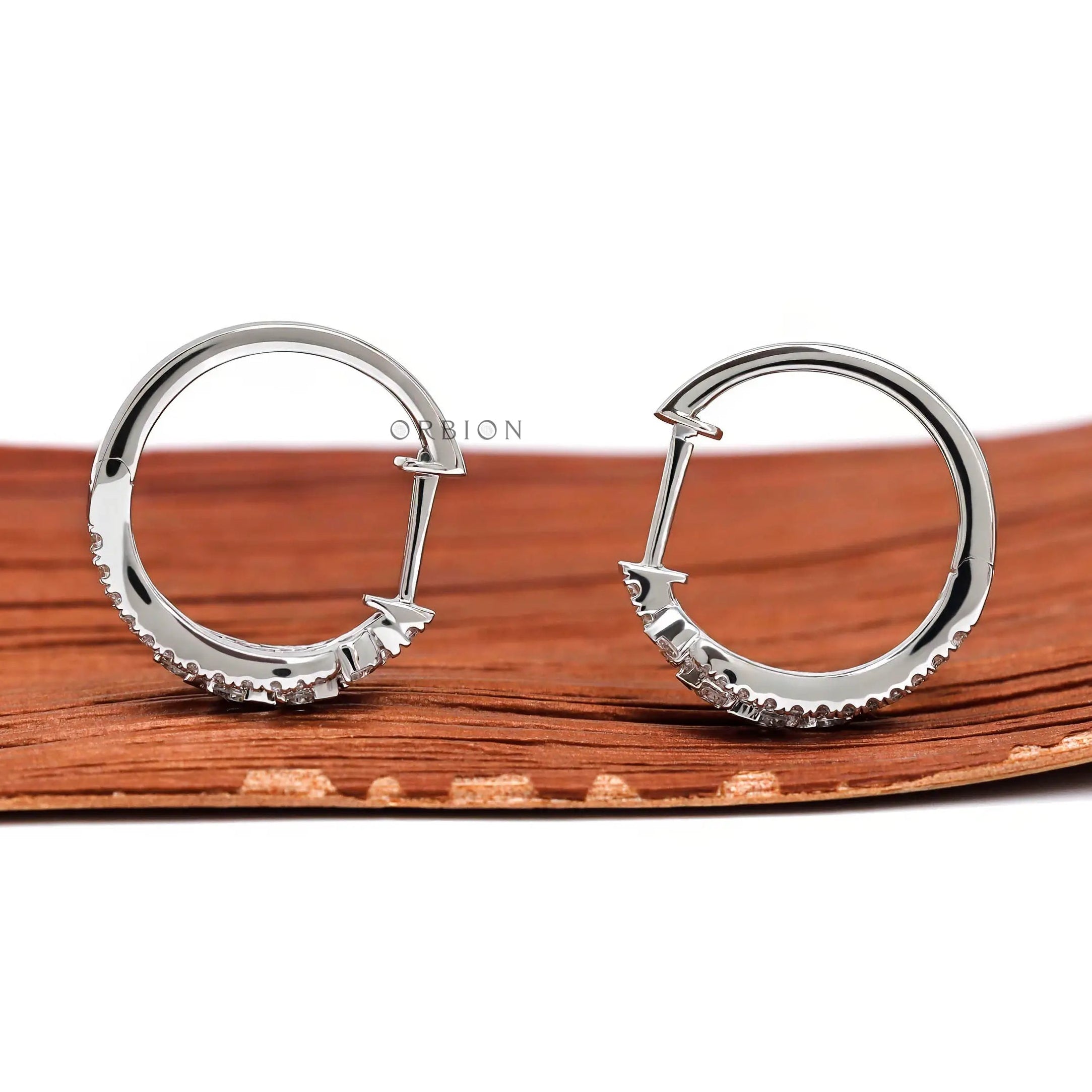 White gold huggie hoops with 0.63 TCW lab diamonds