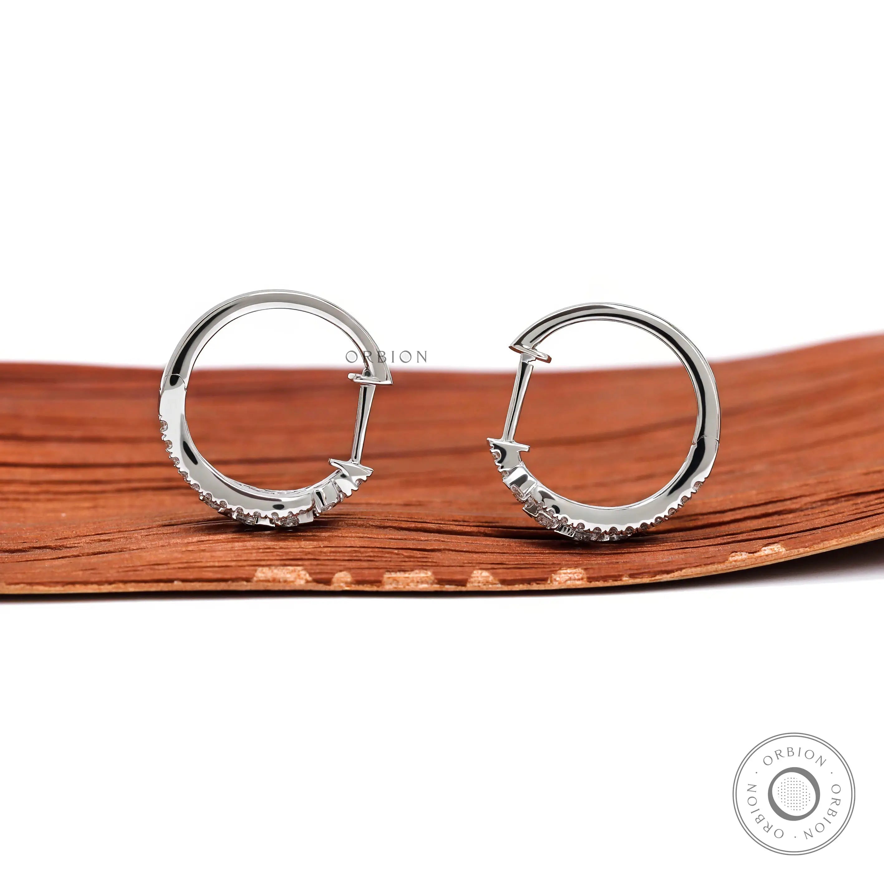 White gold huggie hoops with 0.63 TCW lab diamonds