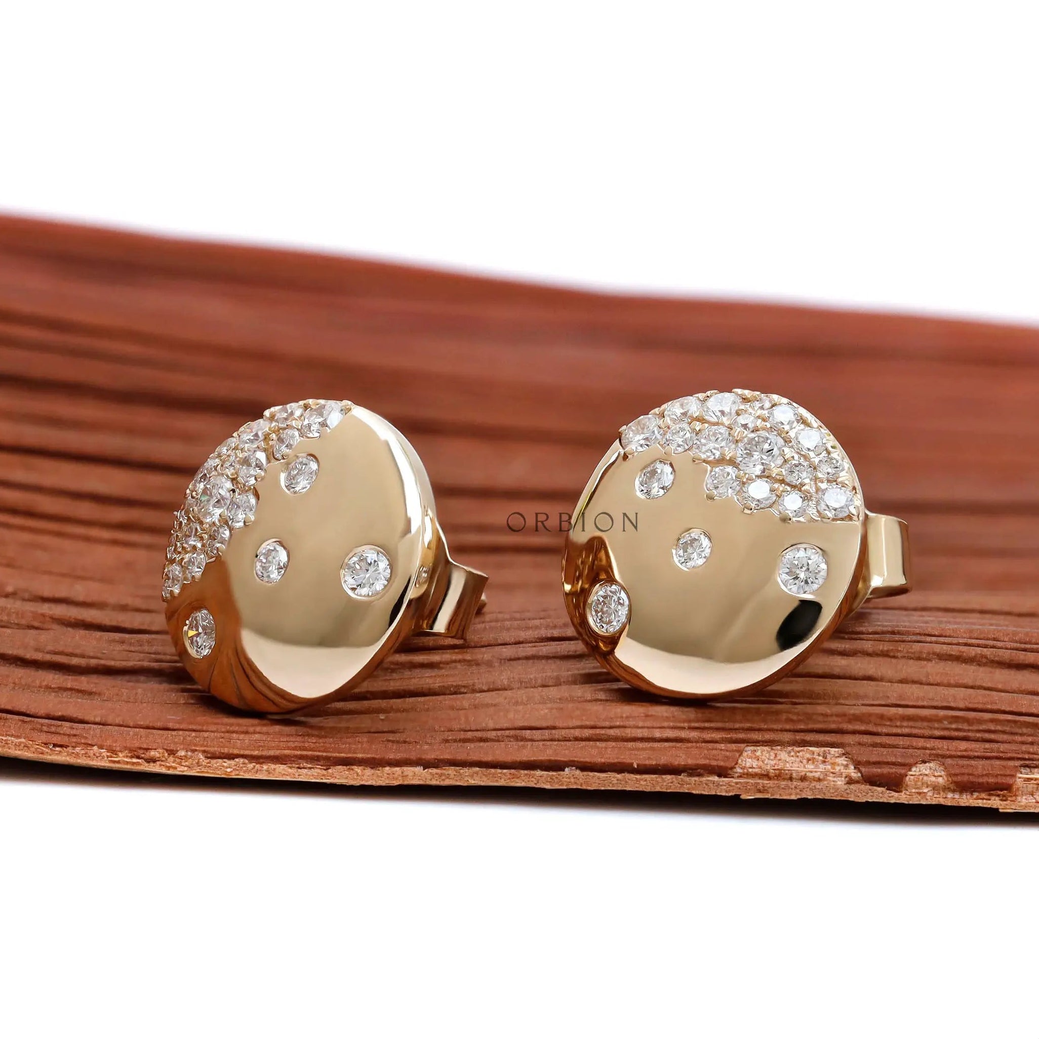 Snowfall inspired flush set diamond stud earrings yellow gold