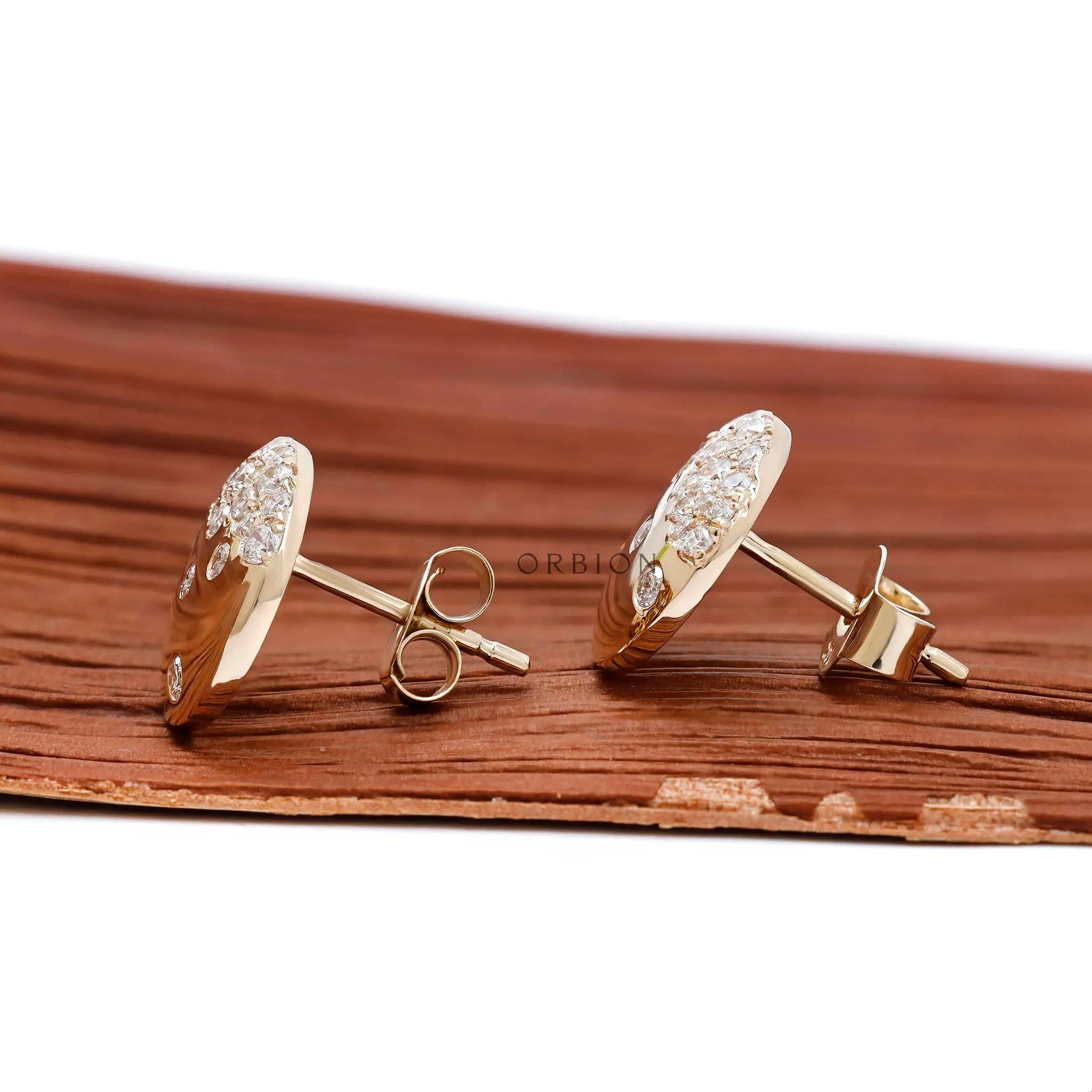 Side profile of flush set lab diamond stud earrings