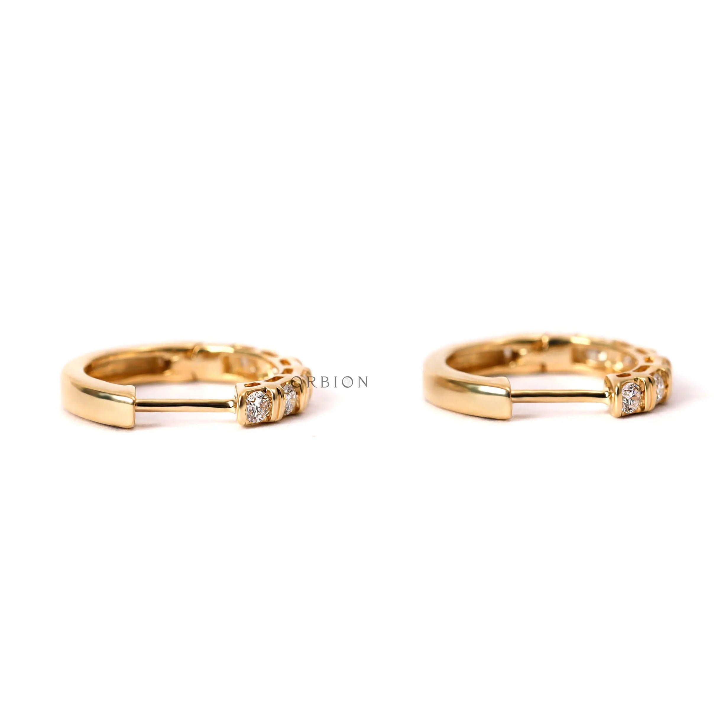 Small diamond huggie hoop earrings with bar setting modern design