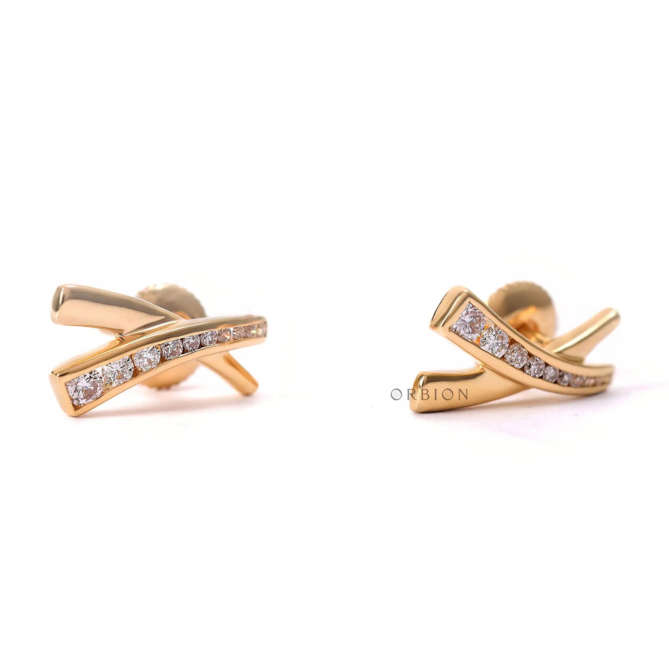 Modern lab diamond X stud earrings with flush set diamonds