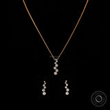Elegant bubble drop journey necklace in rose gold with sparkling diamonds