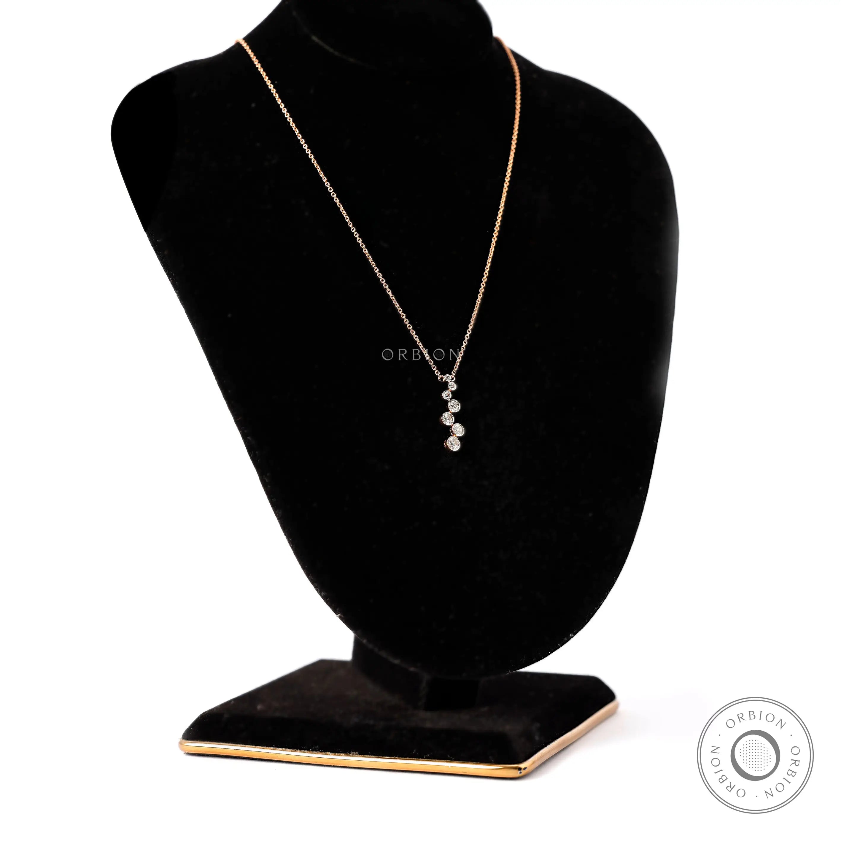 Vertical bezel set diamond drop pendant necklace with round lab diamonds