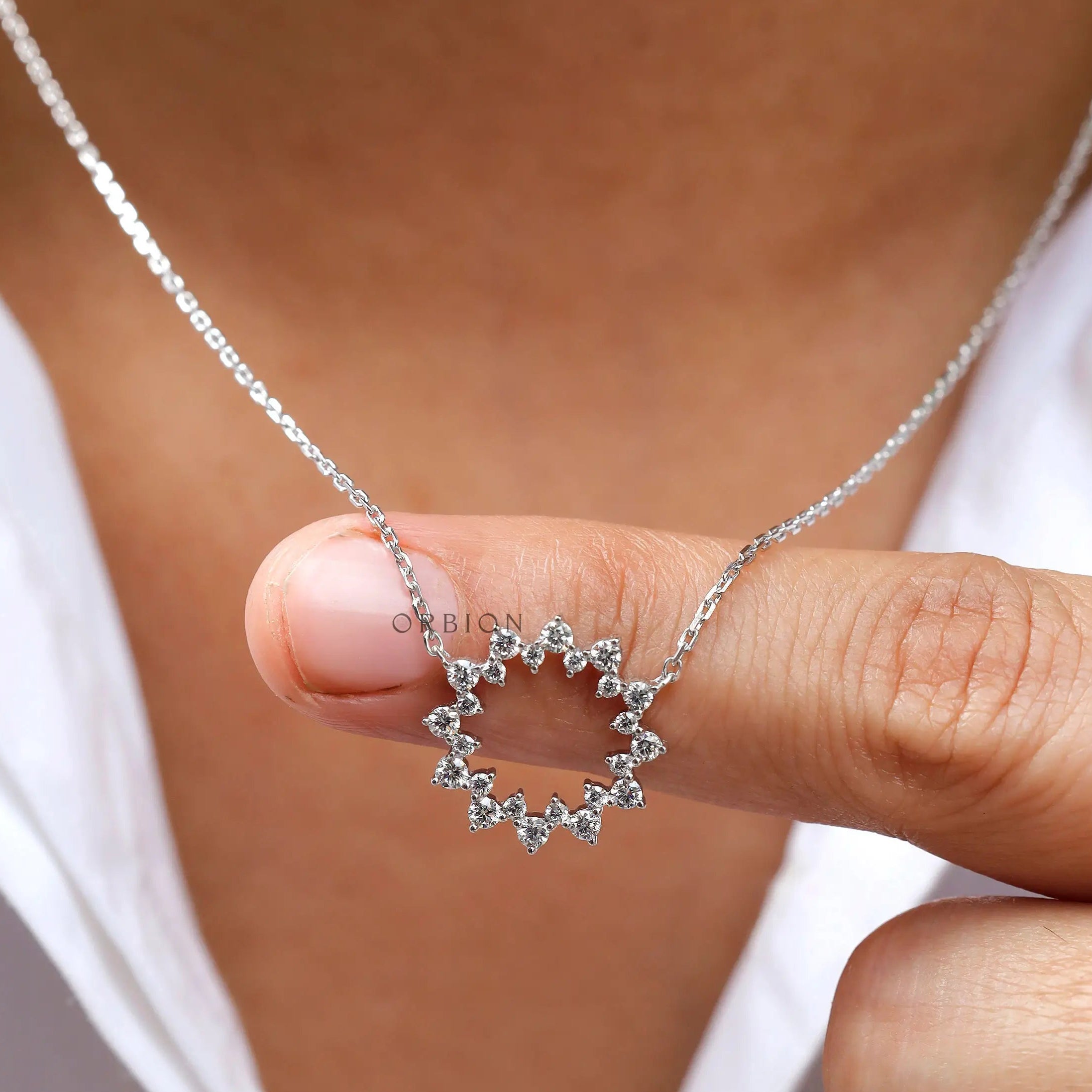 Minimalist diamond circle pendant necklace close-up view