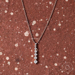 14k rose gold necklace with graduated lab-grown diamonds in a long drop design, perfect for daily wear.