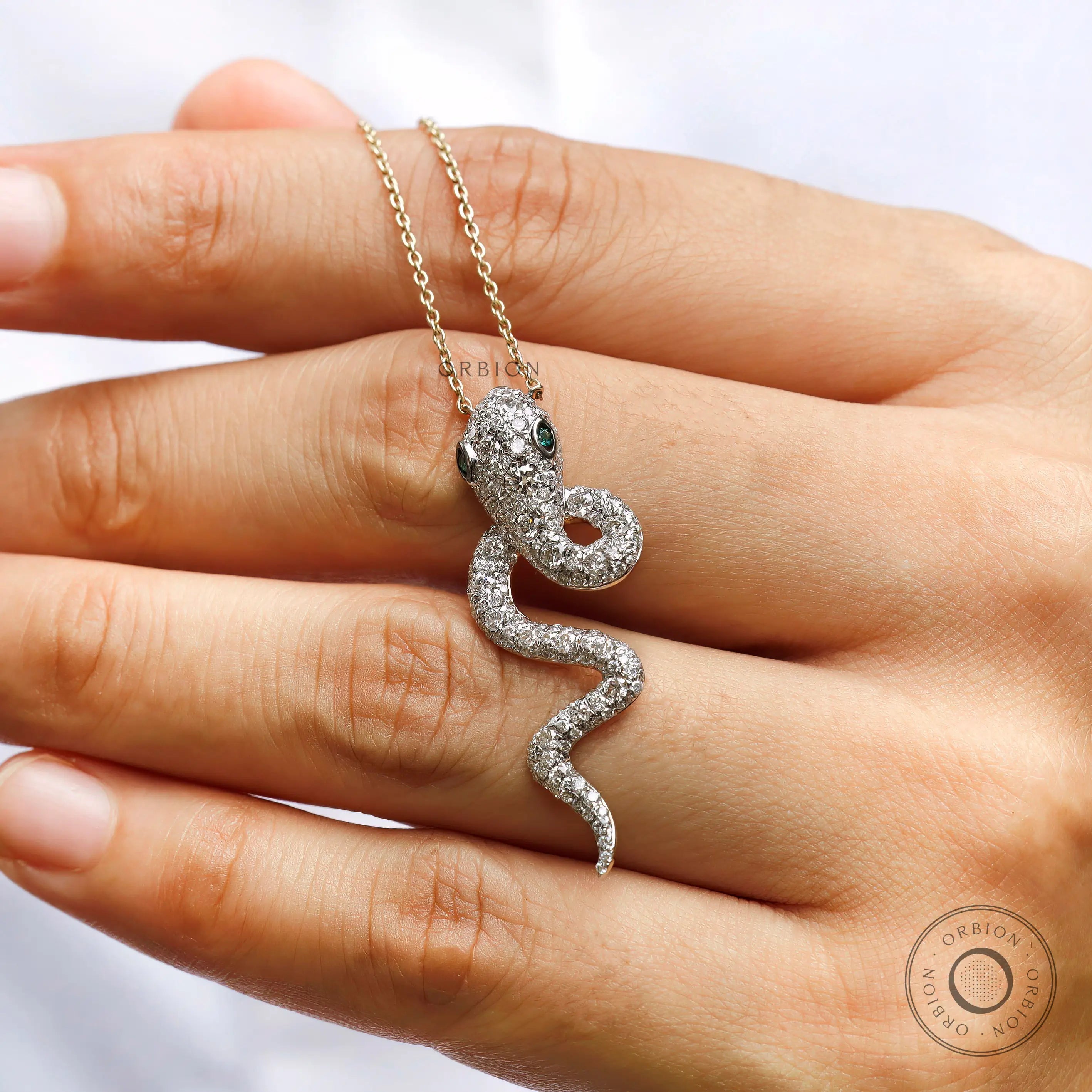 High polish 18K gold iced out serpent pendant