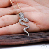 Detailed pave lab diamond snake head pendant close up