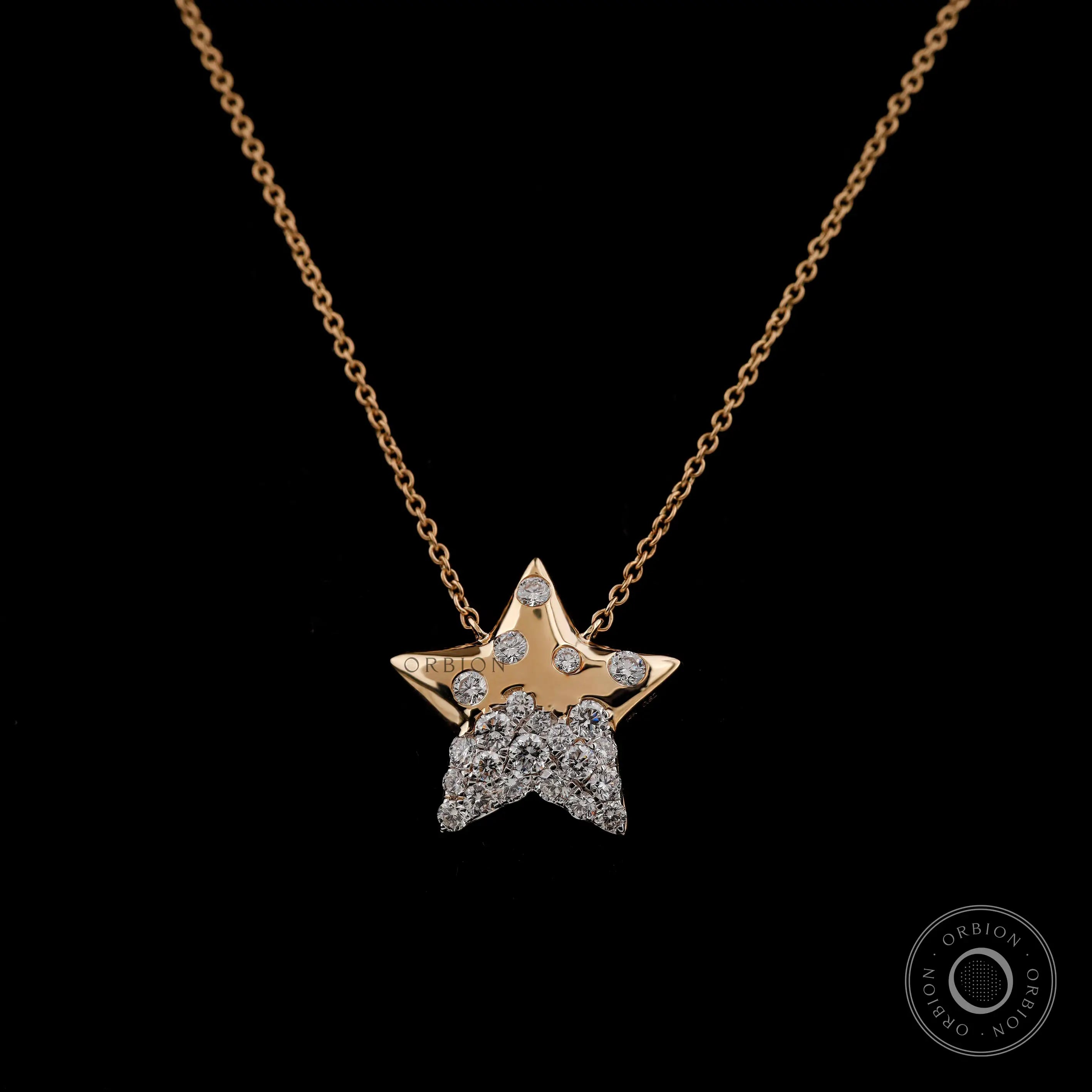 Flush set diamond star necklace in 14K yellow gold close up