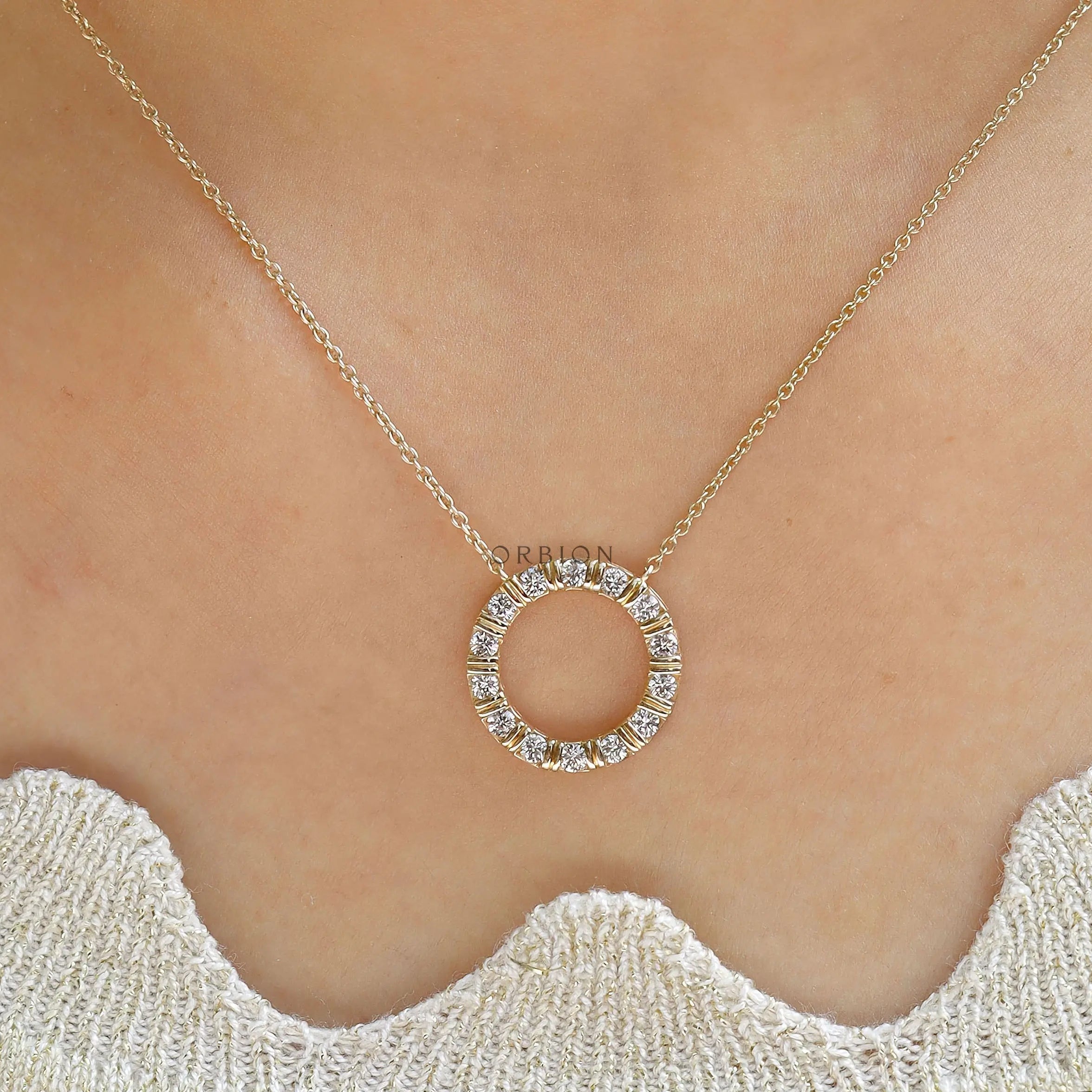 Sustainable lab diamond circle pendant on a model
