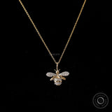 Honey bee pendant necklace in 10K yellow gold with pave set lab diamonds