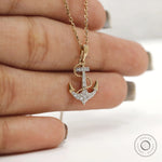 Yellow gold nautical necklace featuring anchor and rope design with lab diamonds