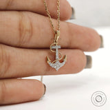 Yellow gold nautical necklace featuring anchor and rope design with lab diamonds
