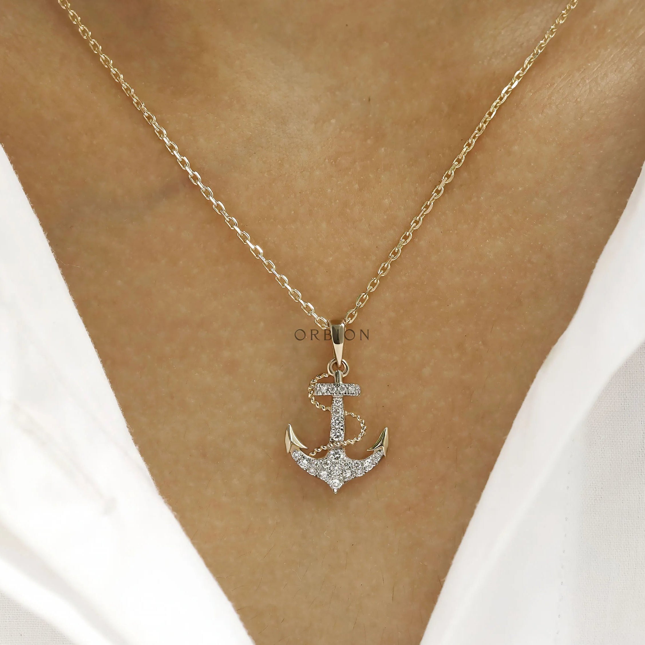 Marine-inspired anchor pendant necklace with rope and lab diamonds in yellow gold