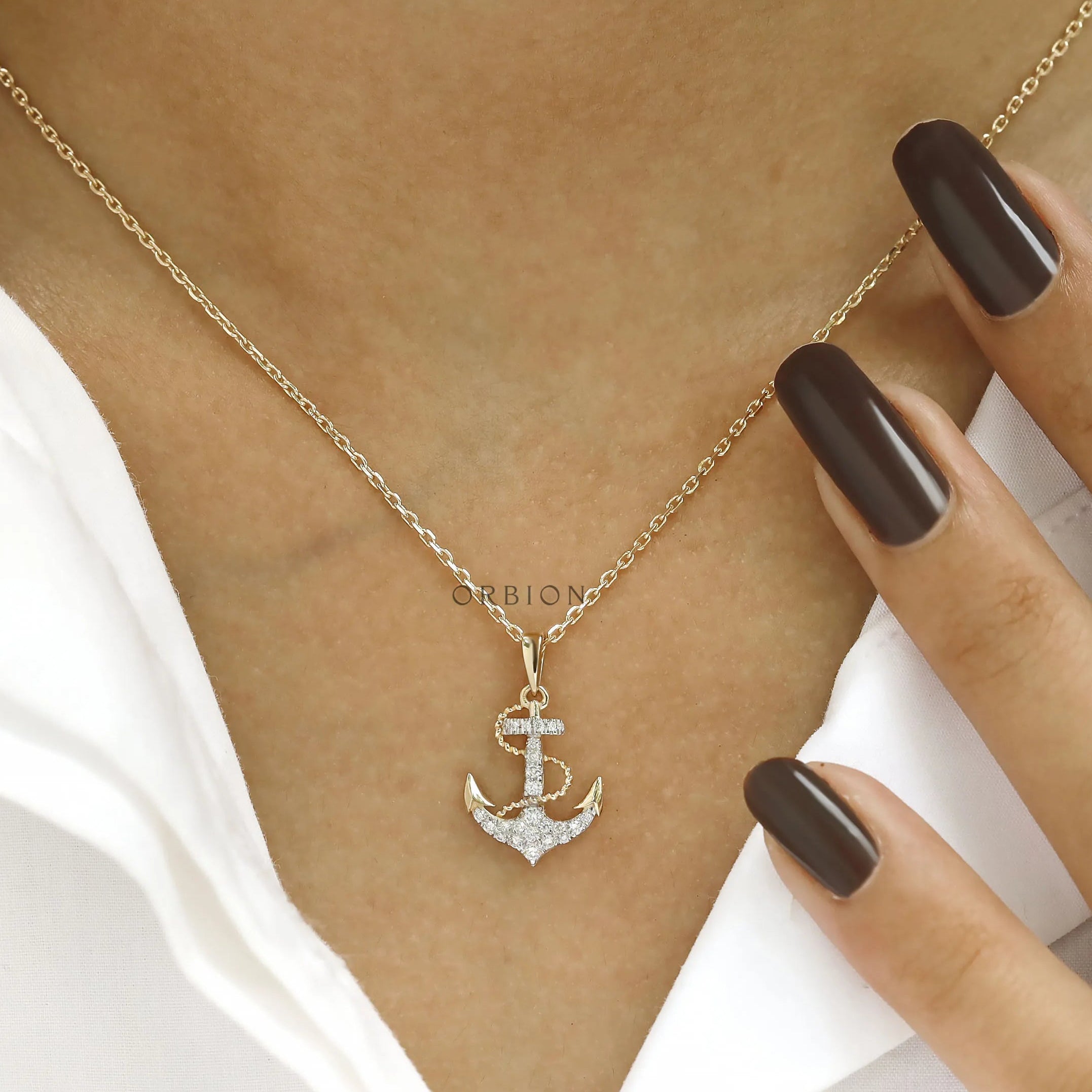 Boater jewelry: yellow gold anchor and rope necklace with sparkling lab diamonds