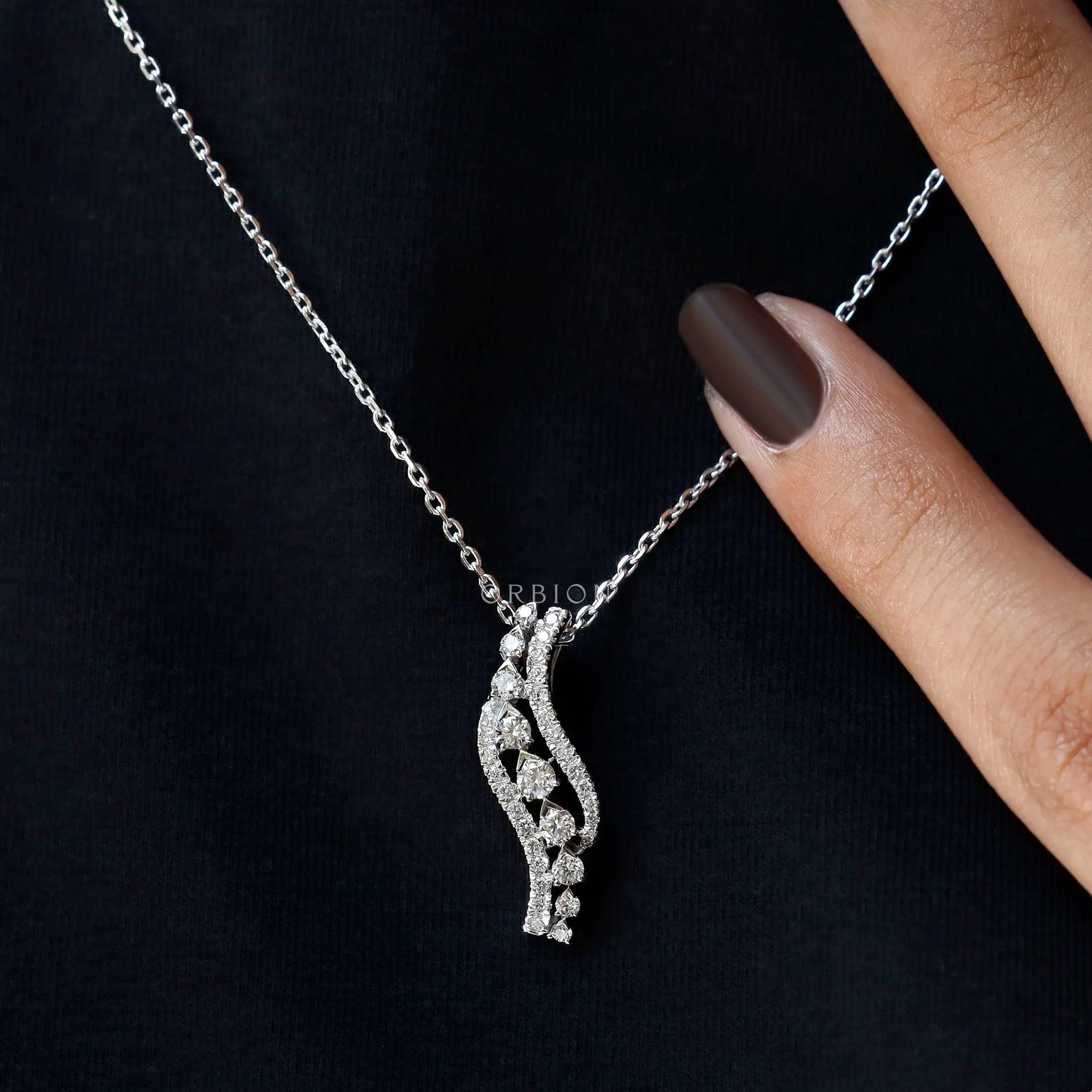 Elegant diamond journey necklace with wavy swirl design