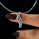 Lab grown diamond wavy swirl journey necklace in 18k white gold