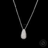 Close up of teardrop diamond pendant with pave setting
