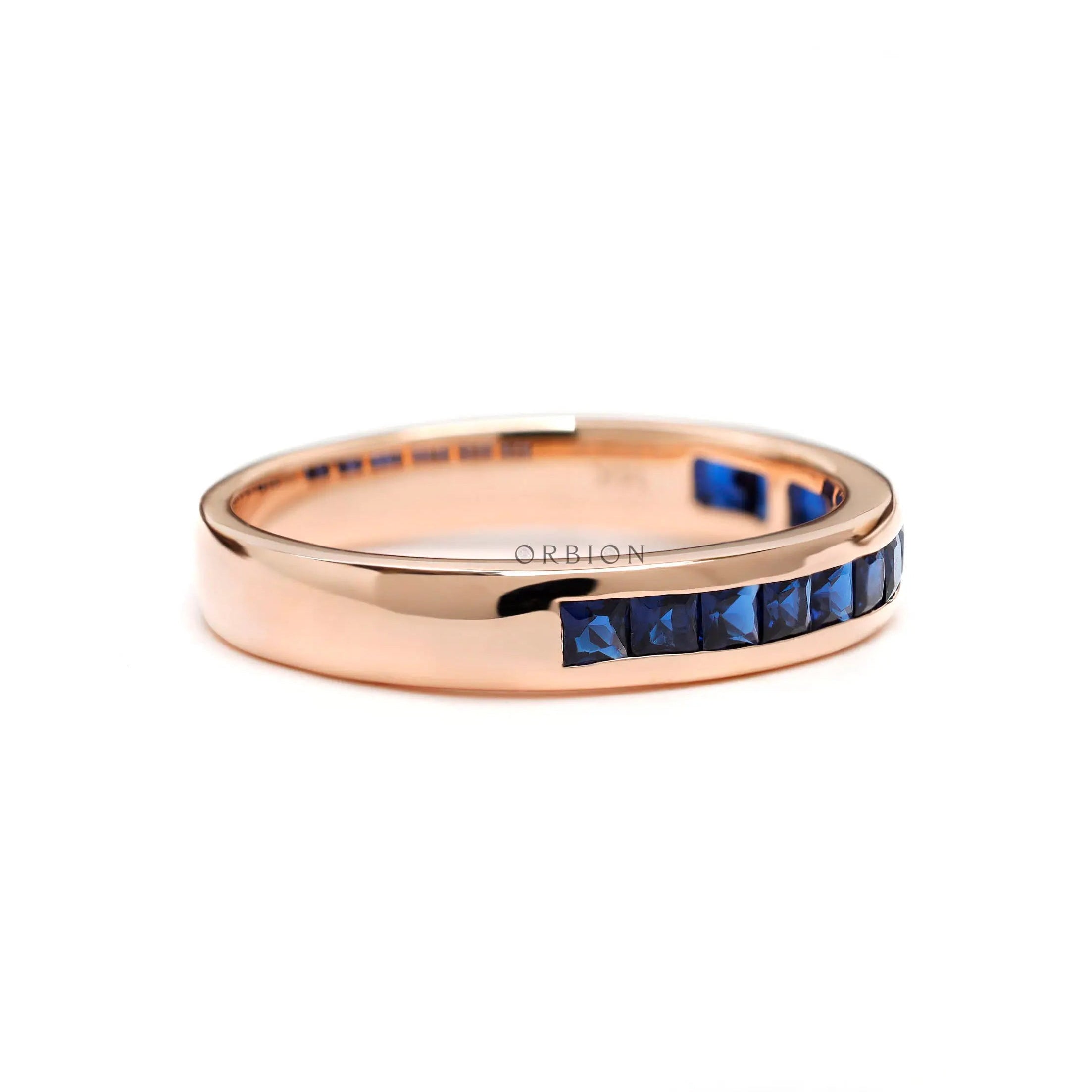 Synthetic princess cut sapphire half eternity ring