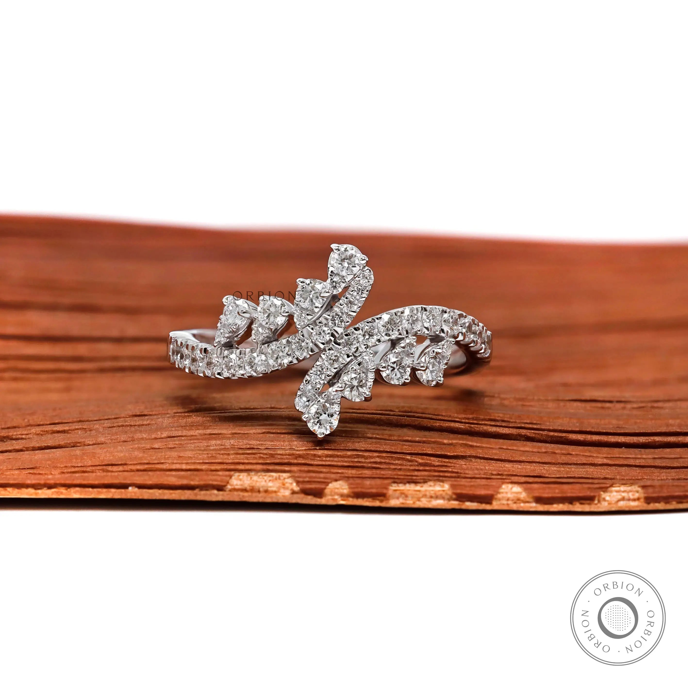 Wave style lab diamond cluster ring in 18K white gold front view