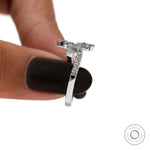 Wave style diamond ring in 18K white gold