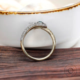 Yellow gold serpent ring with glossy finish