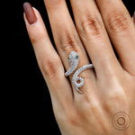 Rose gold serpent ring symbolic jewelry design