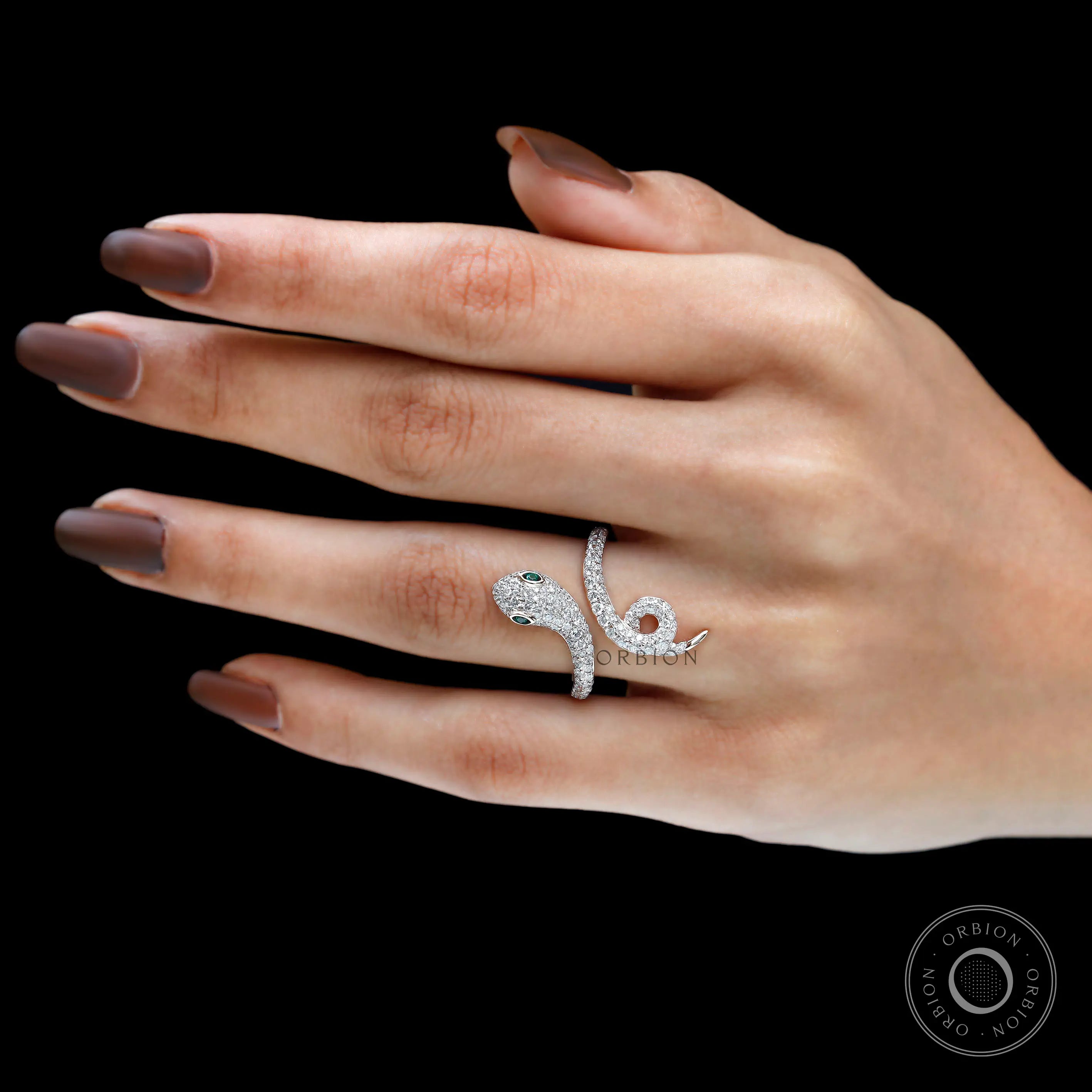 Close up of pave set diamonds on snake body ring