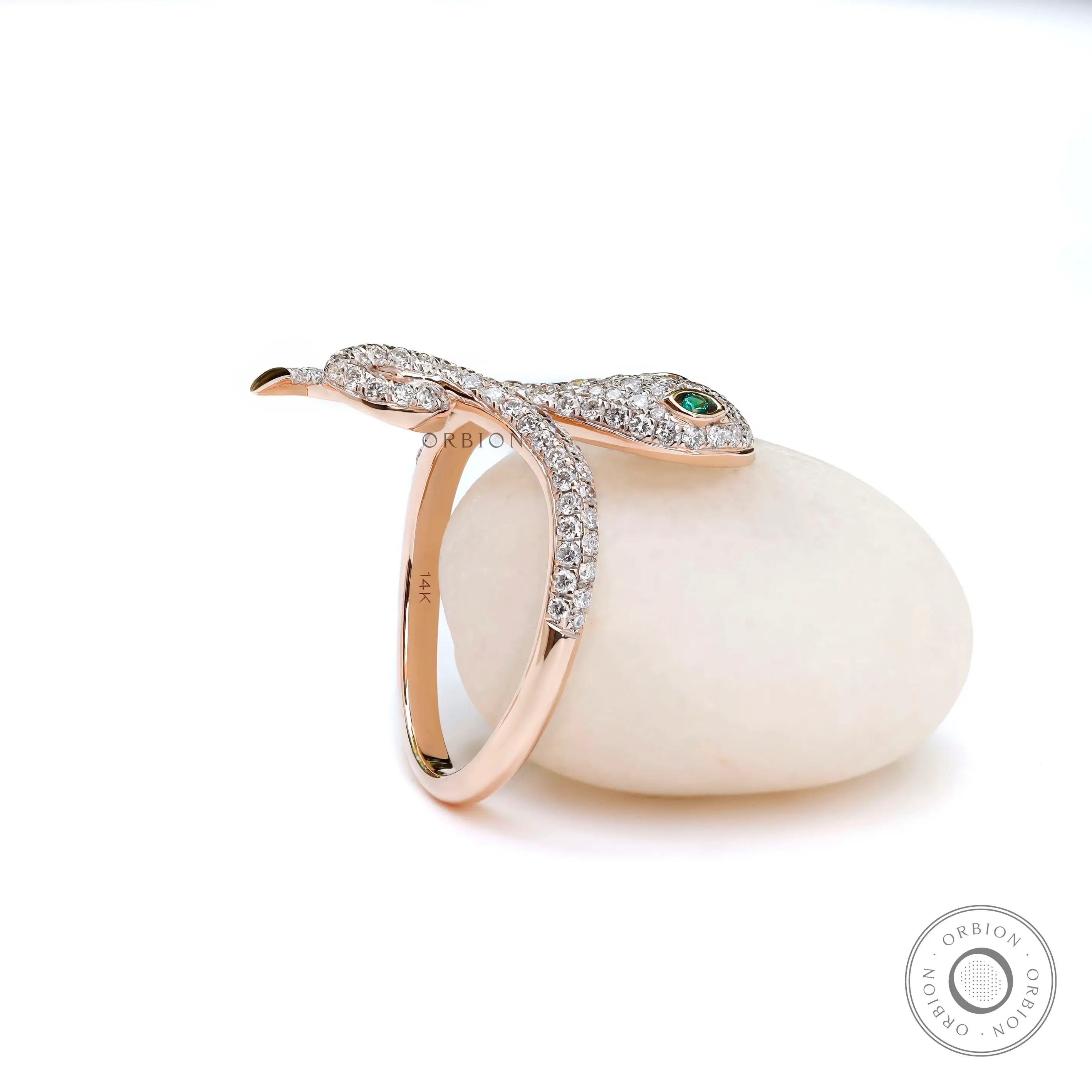 Emerald eye detail on diamond snake head ring