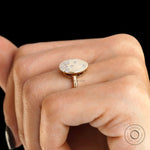 Fine jewelry modern disc ring with polished gold finish
