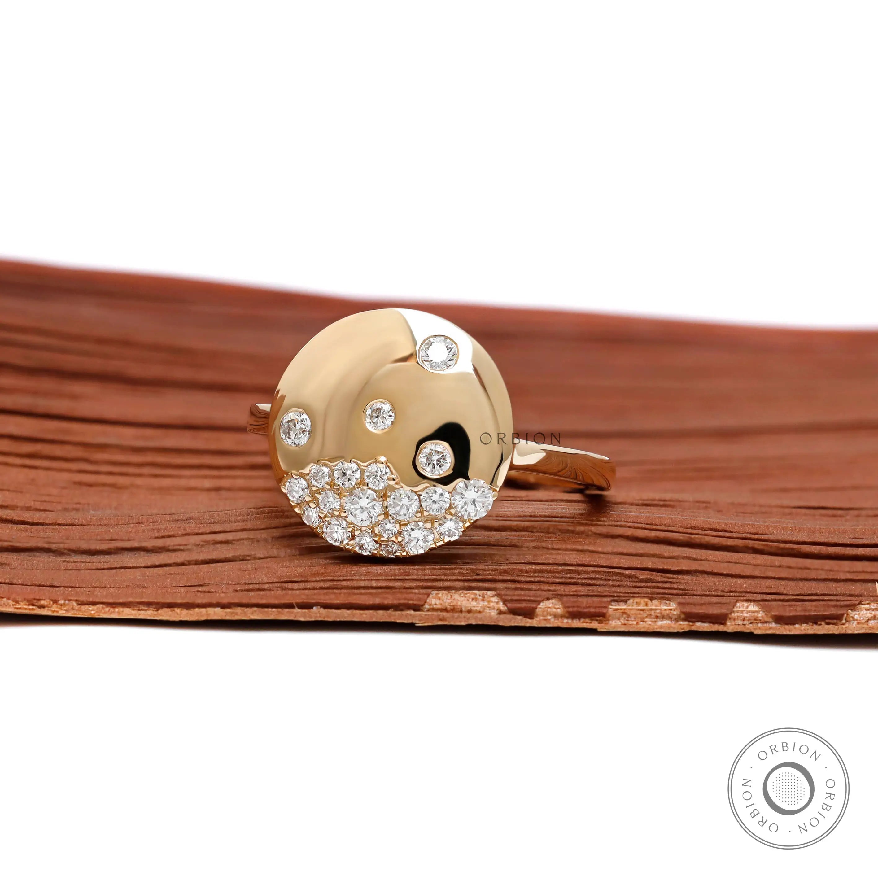 Snowfall inspired flush set diamond disc ring close up