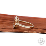 Modern 14k yellow gold statement ring with scattered diamonds