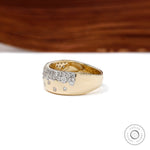 Side perspective of diamond snowfall cigar band showing wide gold profile