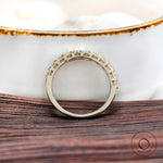 Interior gallery view yellow gold round diamond half eternity band