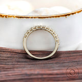 Interior gallery view yellow gold round diamond half eternity band