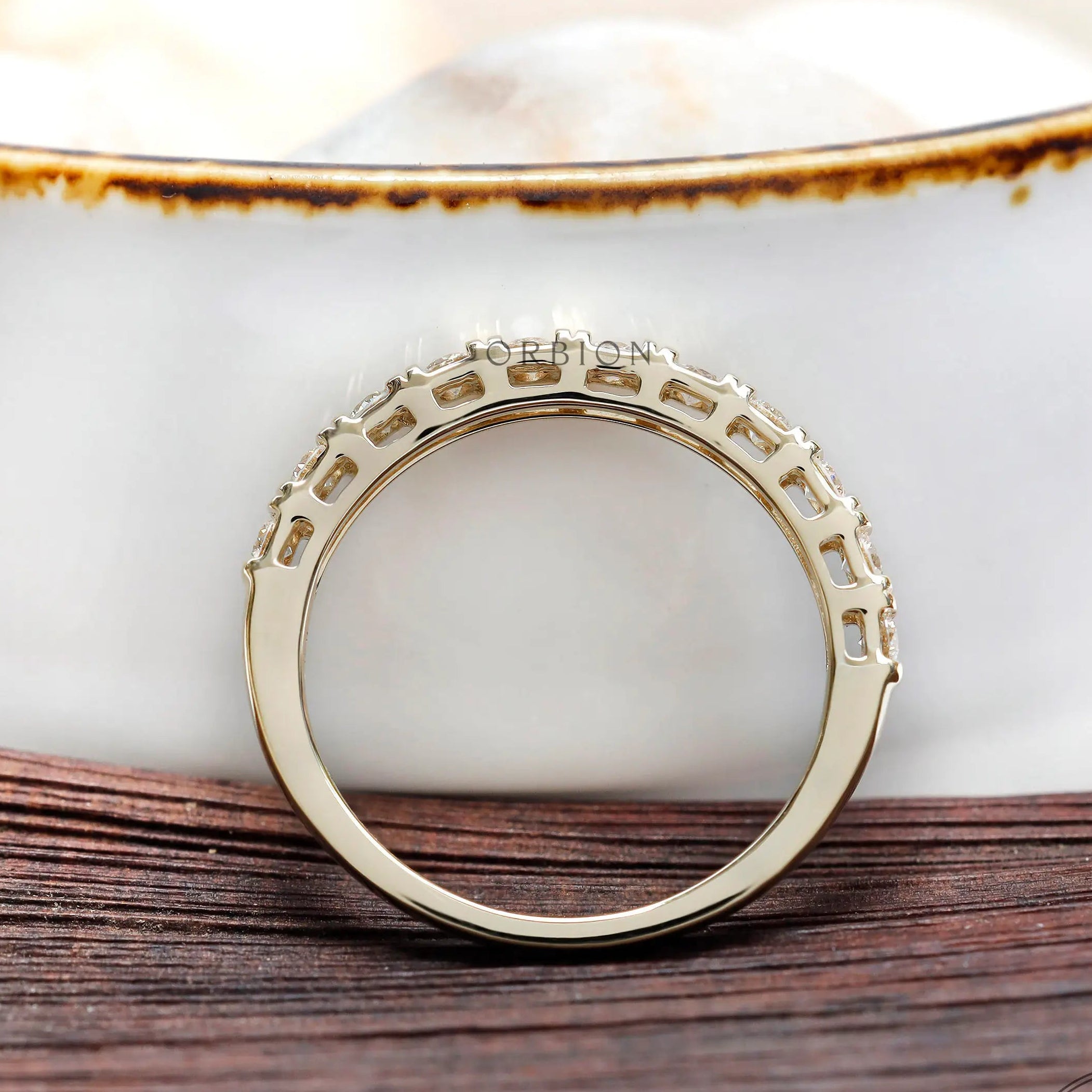 Interior gallery view yellow gold round diamond half eternity band